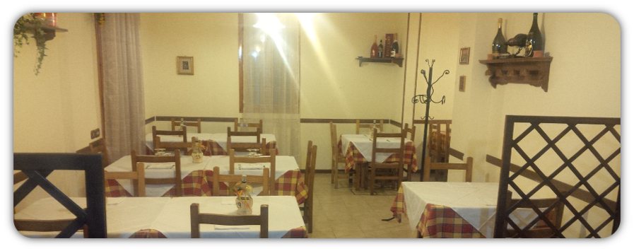 La sala della trattoria, semplice e accogliente.